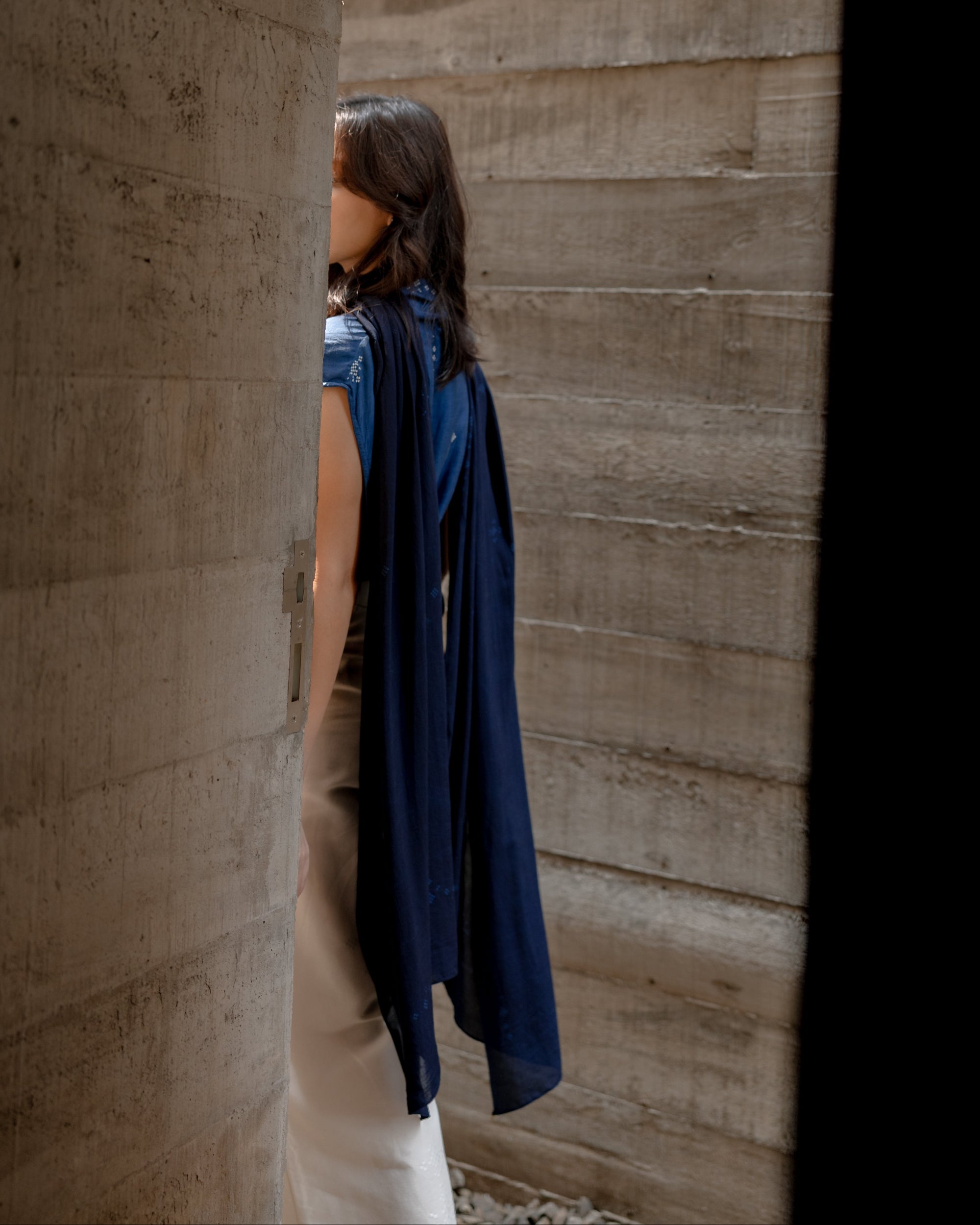 Sheila Dara wearing a dark SukkhaCitta Angkasa Indigo Scarf from SORE The Movie.