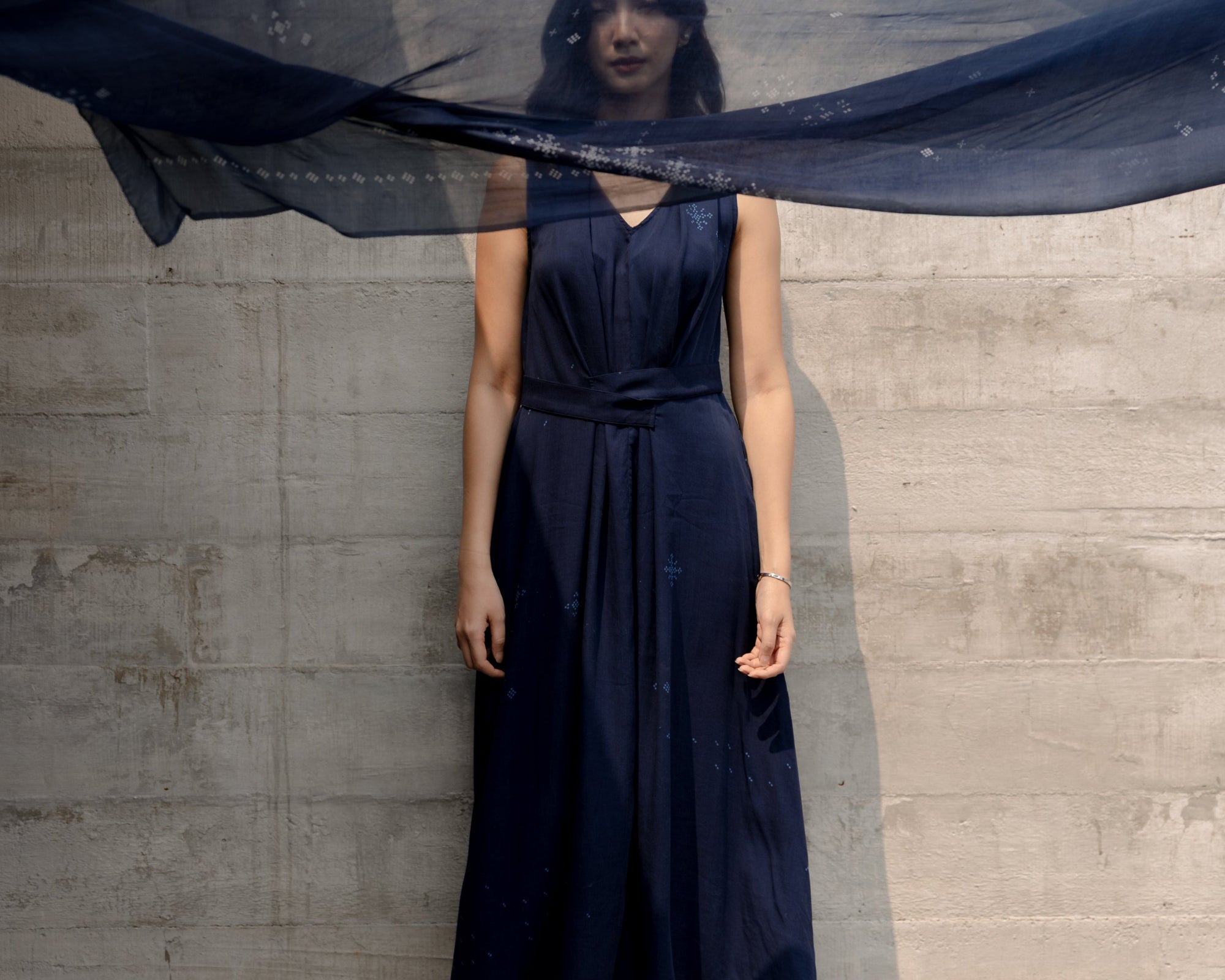Sheila Dara wearing the SukkhaCitta Pleated Indigo dress. As seen on SORE The Movie.