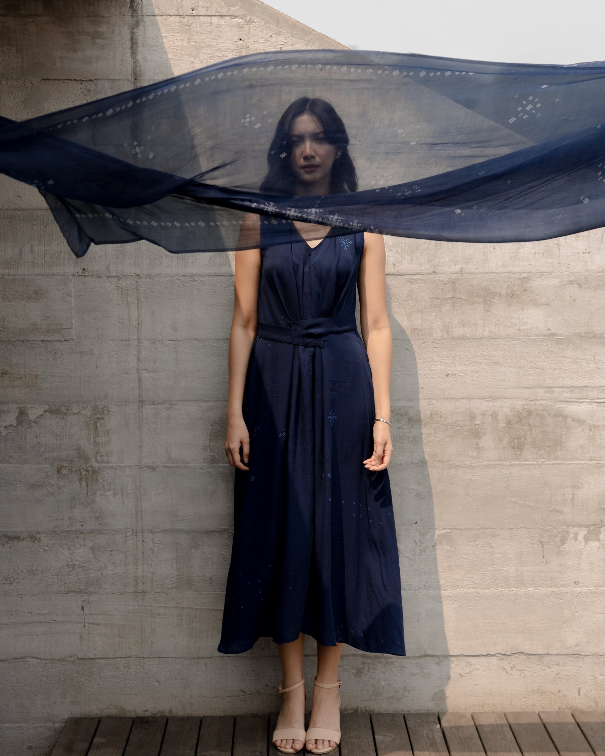 Sheila Dara wearing the SukkhaCitta Pleated Indigo dress. As seen on SORE The Movie.