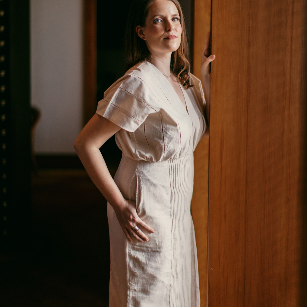 woman in cotton dress, woman posing, woman standing, regenerative cotton dress