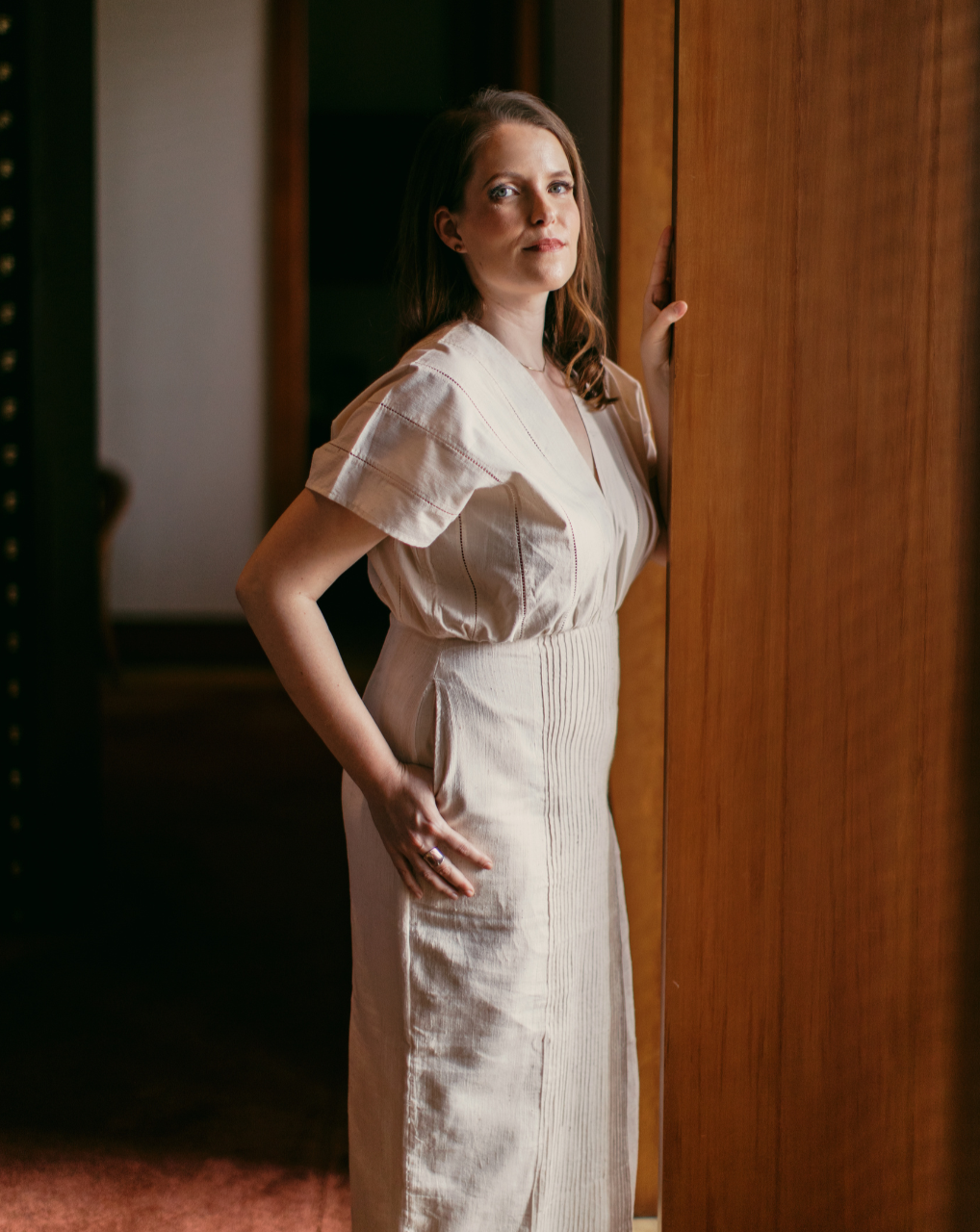 woman in cotton dress, woman posing, woman standing, regenerative cotton dress