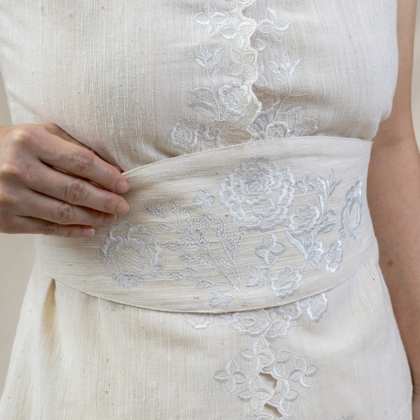white floral embroidered obi from regenerative cotton