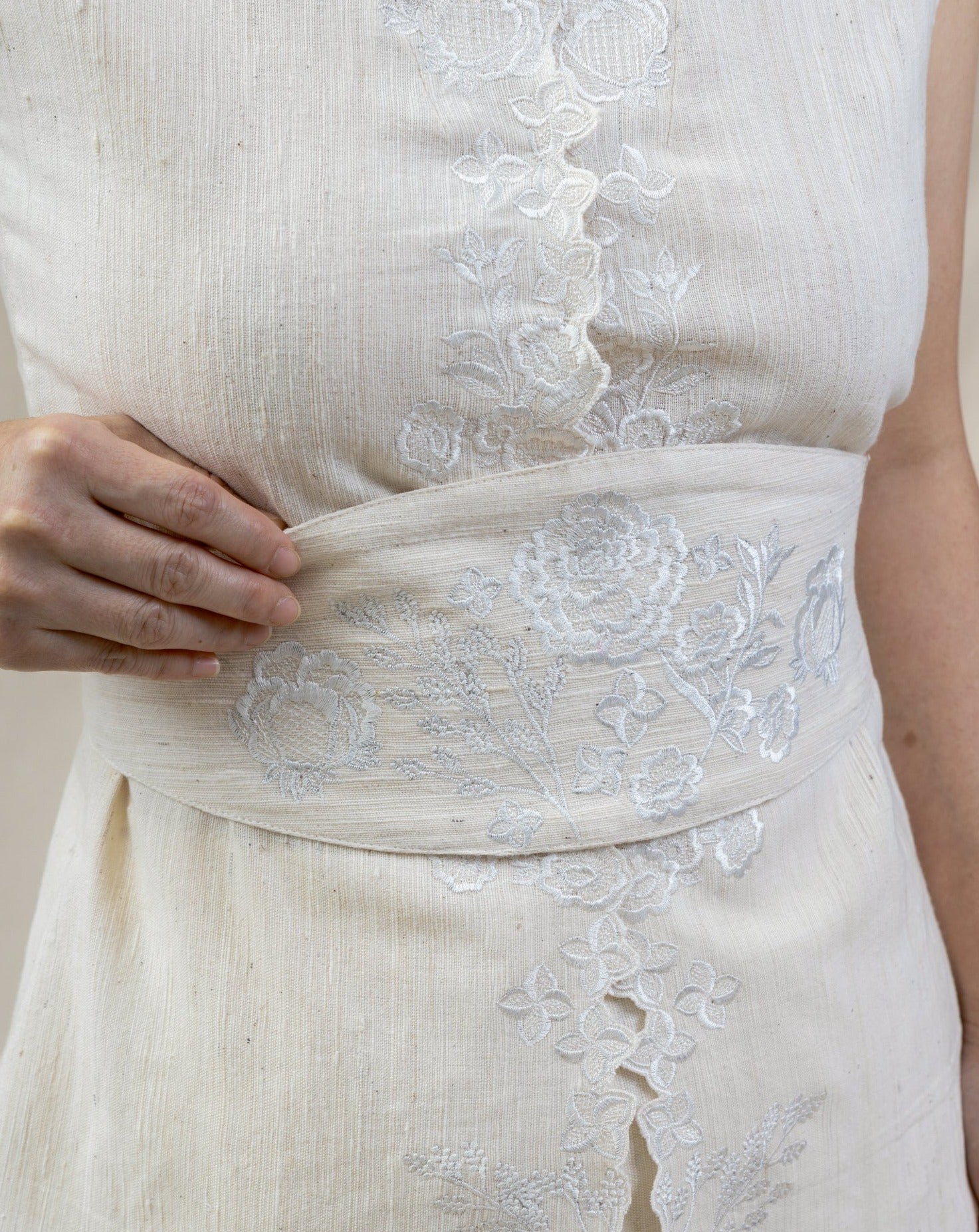 white floral embroidered obi from regenerative cotton